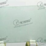 LH FRONT DOOR GLASS GREEN